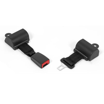 Two black seat belt clips on a white background