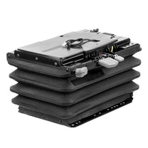 Stack of black and gray electronic components on a white background